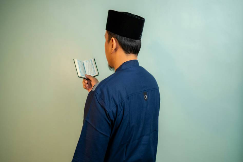 A collection of halal-certified makeup products with natural tones and brushes on a soft beige background